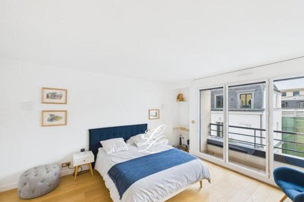 Vente - Appartement 4 pièces 86 m 2 Paris (75008)