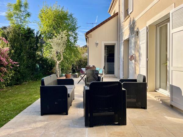 Maison familiale avec terrasse et jardin - potentiel supplémentaire
