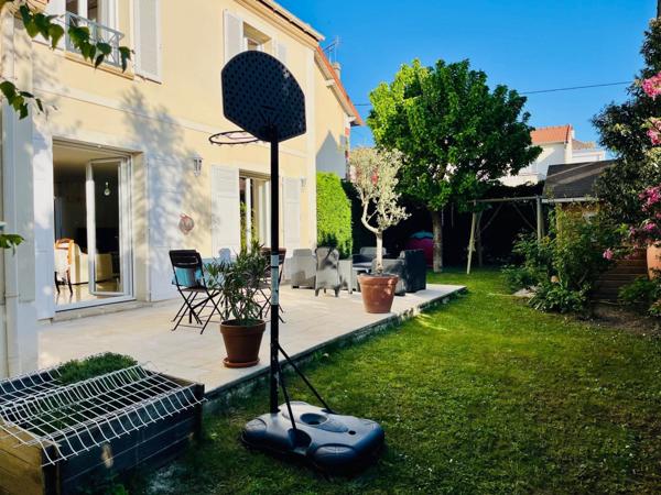 Maison familiale avec terrasse et jardin - potentiel supplémentaire