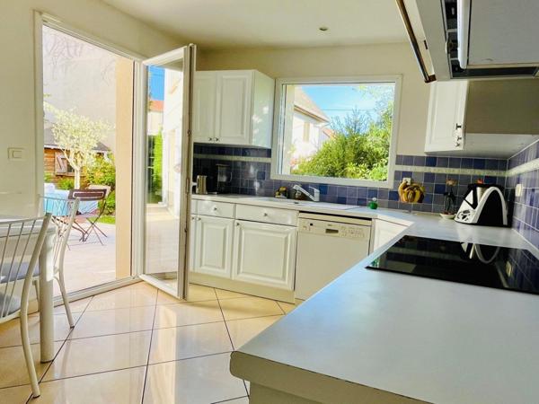 Maison familiale avec terrasse et jardin - potentiel supplémentaire