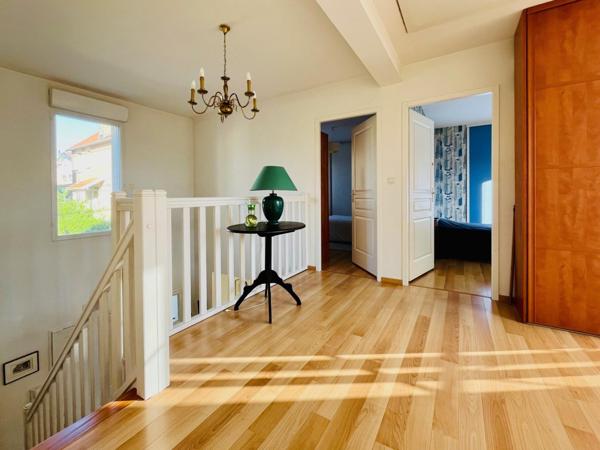 Maison familiale avec terrasse et jardin - potentiel supplémentaire