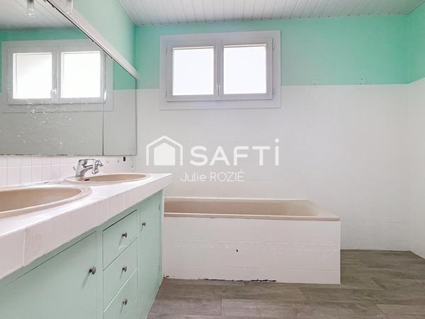 À Castelnau, maison de 120 m², 4 ch, garage et sous-sol.