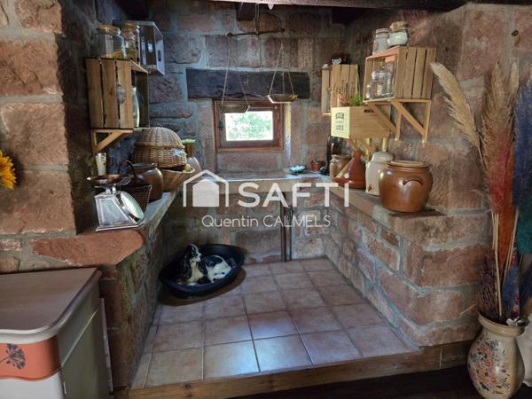 Domaine d’exception en pierre rouge du Vallon de Marcillac