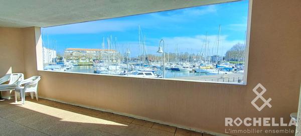 Appartement T4 de 121.84 m2 avec terrasse et garage, résidence avec ascenseur, vue sur bassin de plaisance