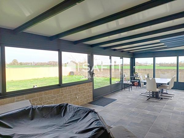 Trois en chambres en plain pied, grand garage, grande véranda, jardin et plus aux portes de Niort !