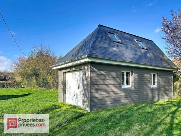 Maison moderne au calme au coeur du pays d'auge , avec ses annexes dont 5 garages
