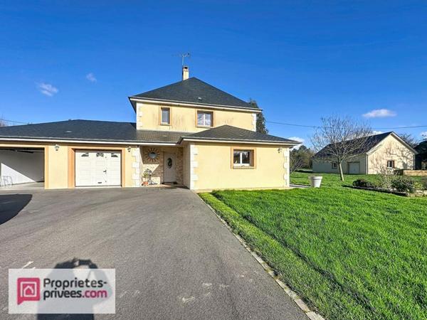 Maison moderne au calme au coeur du pays d'auge , avec ses annexes dont 5 garages