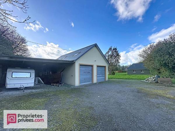 Maison moderne au calme au coeur du pays d'auge , avec ses annexes dont 5 garages