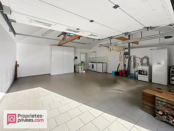 Maison moderne au calme au coeur du pays d'auge , avec ses annexes dont 5 garages