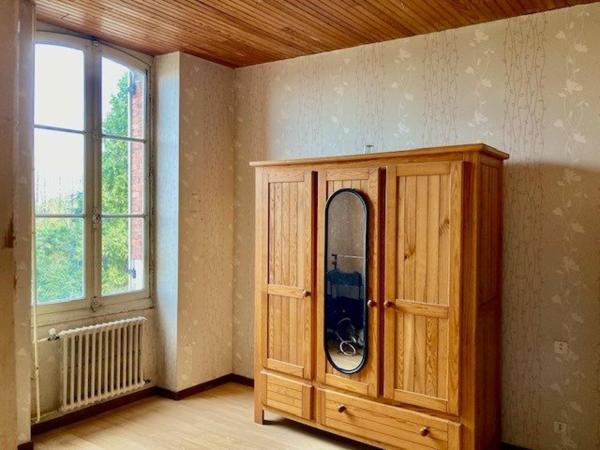 MAISON DE VILLE AVEC JARDIN ET GARAGE