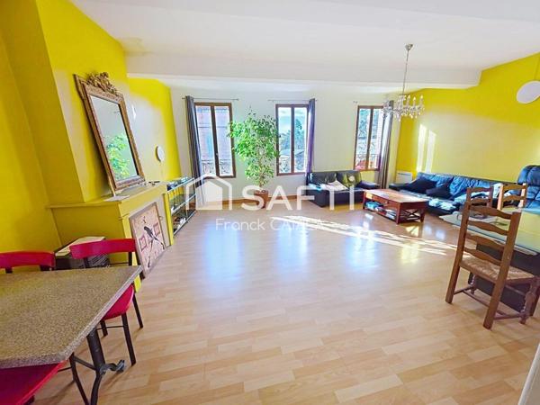 Immeuble avec local commercial loué