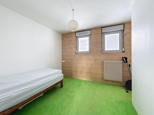 Appartement avec vu dégagée , balcon, cave et garage privatif