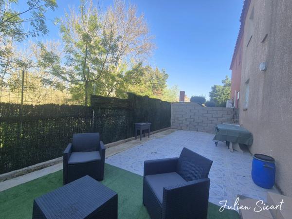 Maison 2 faces avec garage et extérieur