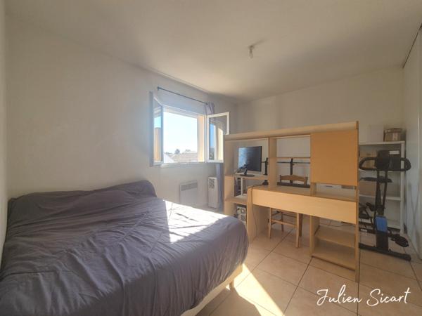 Maison 2 faces avec garage et extérieur