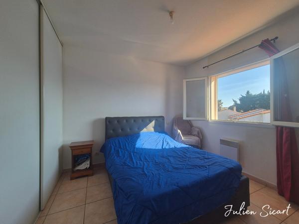 Maison 2 faces avec garage et extérieur