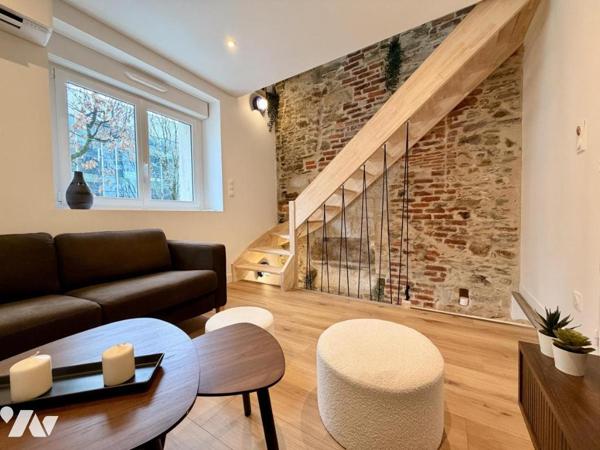 MAISON DE VILLE AVEC TERRASSE A TALENSAC