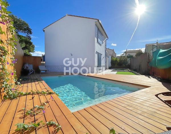 Saint Cyprien maison divisée en 2 appartements, 5 pièces, garage, jardin et piscine composé de deux habitations.