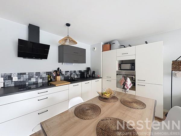 Appartement - 62m² - 2 chambres - Balcon - Stationnement couvert