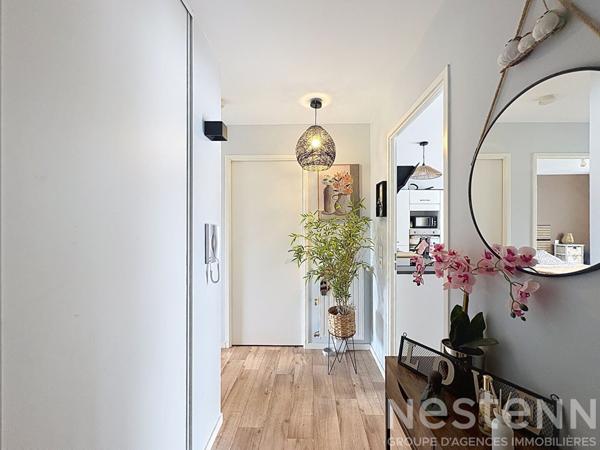 Appartement - 62m² - 2 chambres - Balcon - Stationnement couvert