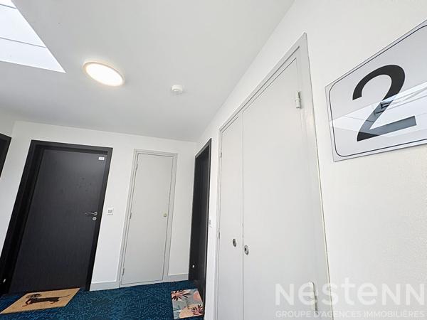 Appartement - 62m² - 2 chambres - Balcon - Stationnement couvert