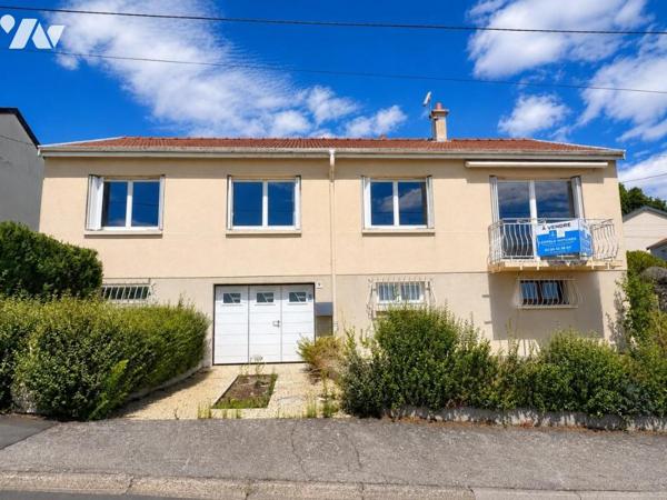 Maison de type T6 avec garage, terrasse et jardin