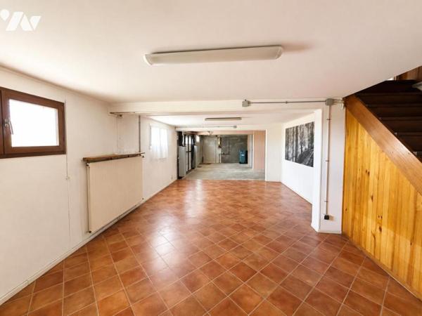 Maison de type T6 avec garage, terrasse et jardin