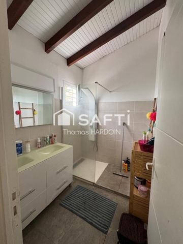 Maison mitoyenne jardin, proche plage et commerces