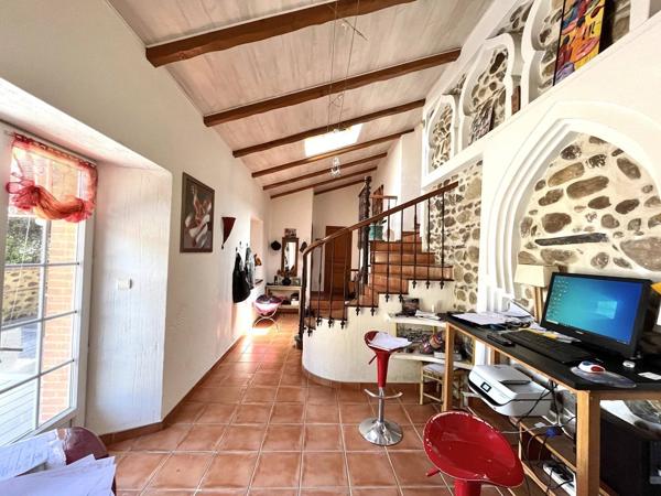 Maison 10 pièces 248 m² habitable.