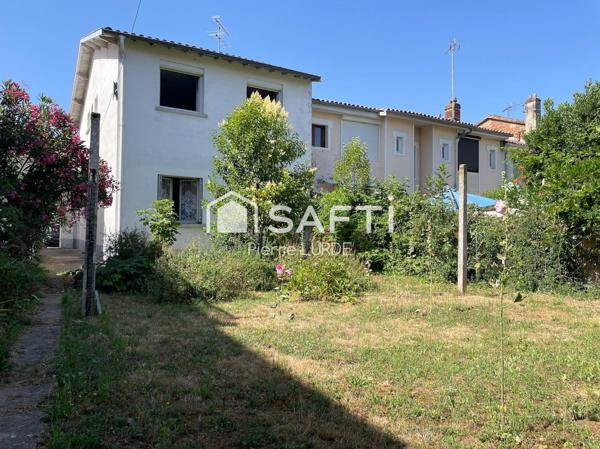 Maison de ville de 92 m2 avec garage et jardin