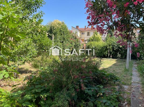 Maison de ville de 92 m2 avec garage et jardin