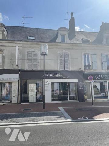 IMMEUBLE A USAGE DE COMMERCE ET D'HABITATION