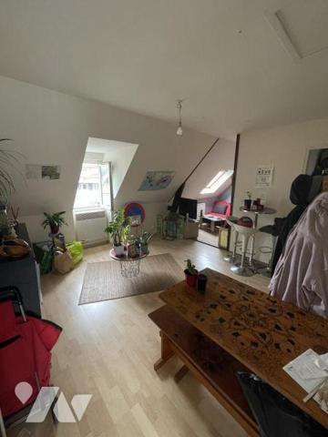 IMMEUBLE A USAGE DE COMMERCE ET D'HABITATION