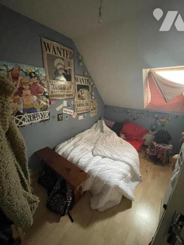 IMMEUBLE A USAGE DE COMMERCE ET D'HABITATION