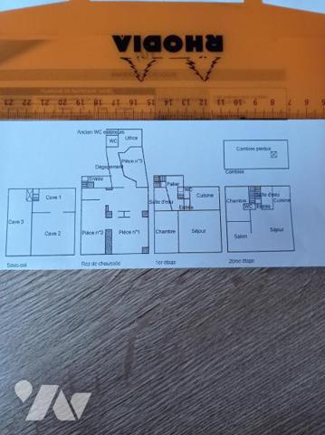 IMMEUBLE A USAGE DE COMMERCE ET D'HABITATION