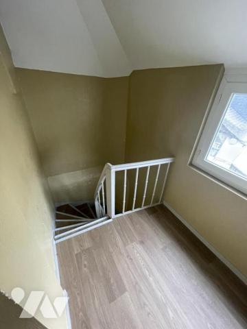 IMMEUBLE A USAGE DE COMMERCE ET D'HABITATION