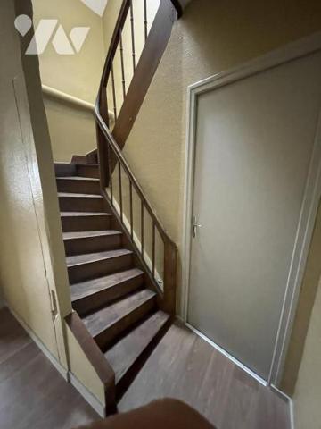 IMMEUBLE A USAGE DE COMMERCE ET D'HABITATION