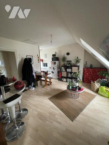 IMMEUBLE A USAGE DE COMMERCE ET D'HABITATION