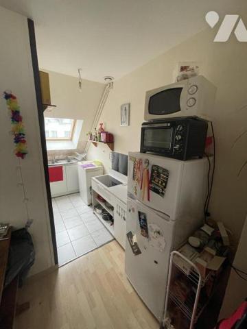 IMMEUBLE A USAGE DE COMMERCE ET D'HABITATION