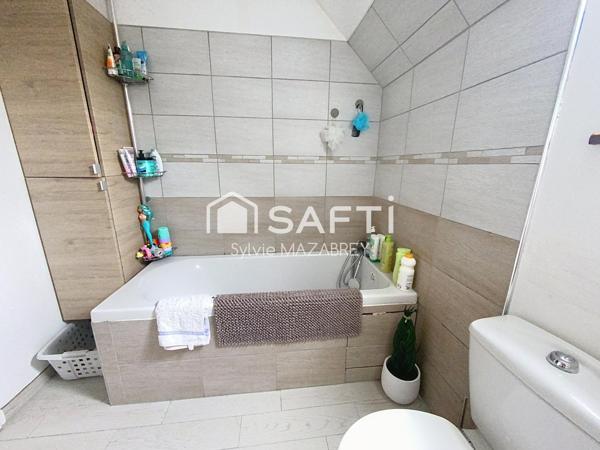 À découvrir sans tarder ! Charmante maison 5 pièces – 122 m² avec jardin et sous-sol total