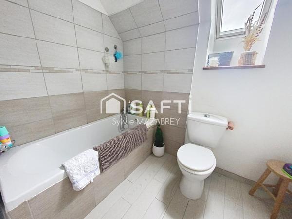 À découvrir sans tarder ! Charmante maison 5 pièces – 122 m² avec jardin et sous-sol total