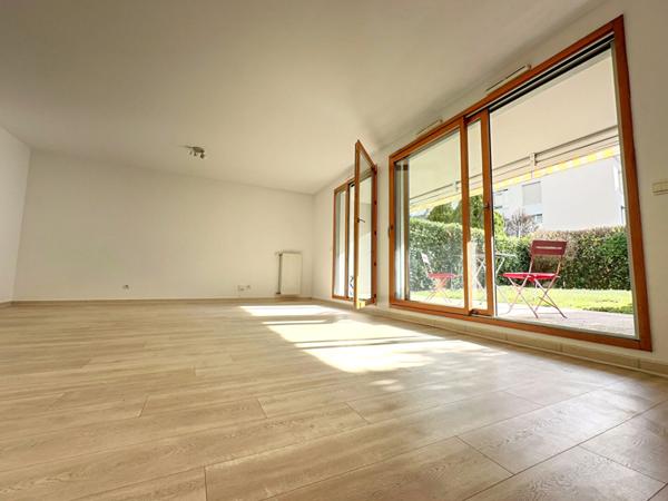 Appartement T4 de 89m² en rez de jardin privatif de 55m² et terrasse de 13m²