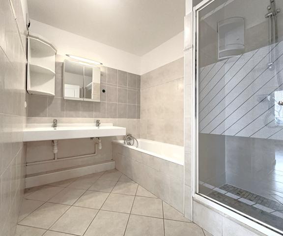 Appartement T4 de 89m² en rez de jardin privatif de 55m² et terrasse de 13m²