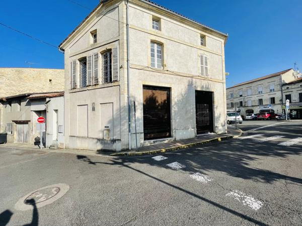 Immeuble de ville avec local commercial