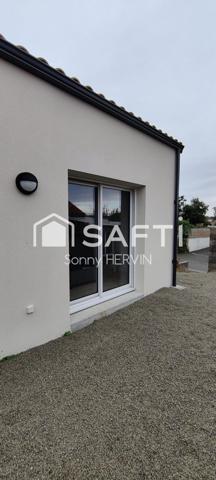 Immeuble de trois appartements de plain-pied + garages