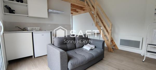 Immeuble de trois appartements de plain-pied + garages