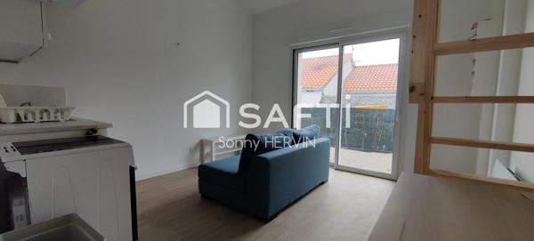 Immeuble de trois appartements de plain-pied + garages