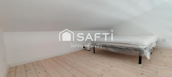 Immeuble de trois appartements de plain-pied + garages