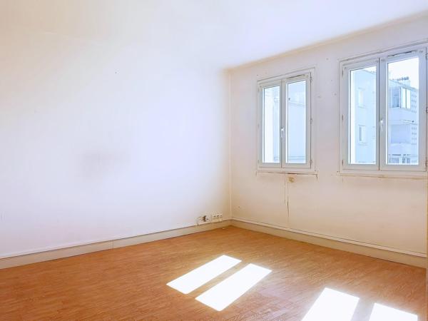 T3 traversant lumineux avec balcons