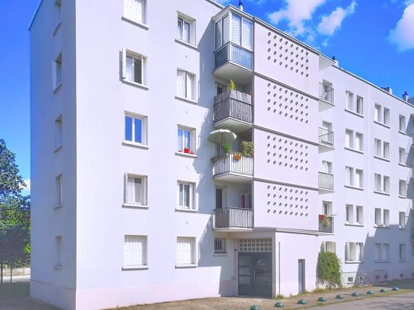 T3 traversant lumineux avec balcons