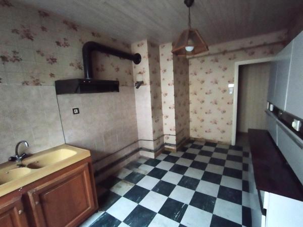 Appartement 64m² env. Lumineux, garage, cave.